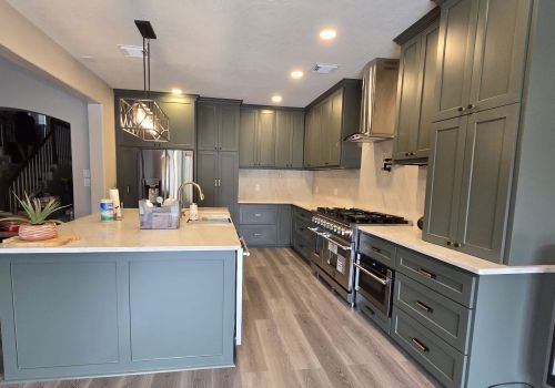 buffalo-home-remodeling-and-remediation-services-dark-green-kitchen-remodel-island-hardwood-floors